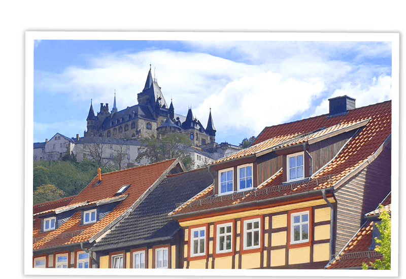 Vorschaubild für Wernigerode mit Fachwerkhäusern der Altstadt und dem Schloss Wernigerode im Hintergrund